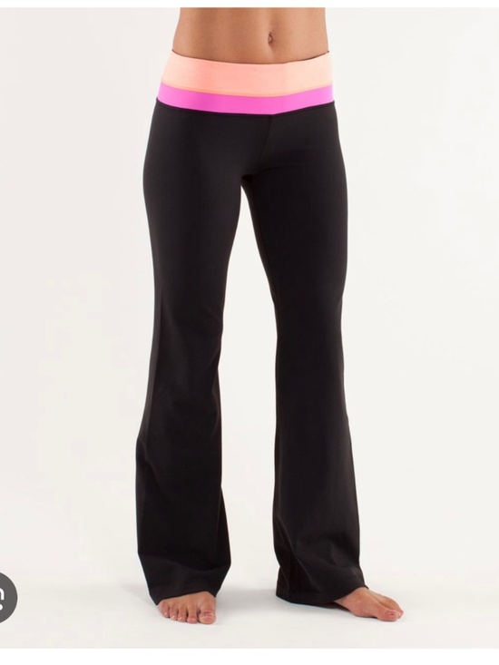 lululemon athletica Pants - Lululemon Astro Flared Pants with a crossover waistband. Size 6